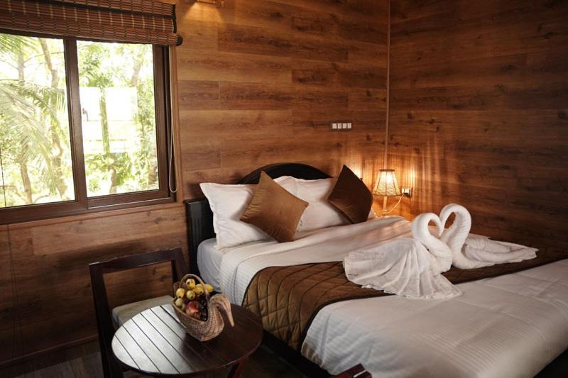 Mango Meadows Hotel กัตตะยัม ภายนอก รูปภาพ