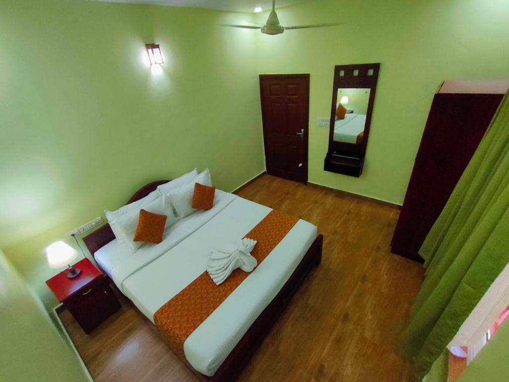 Mango Meadows Hotel กัตตะยัม ภายนอก รูปภาพ