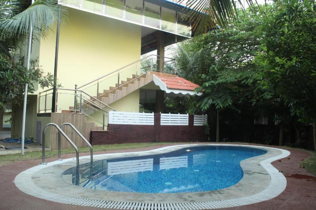 Mango Meadows Hotel กัตตะยัม ภายนอก รูปภาพ
