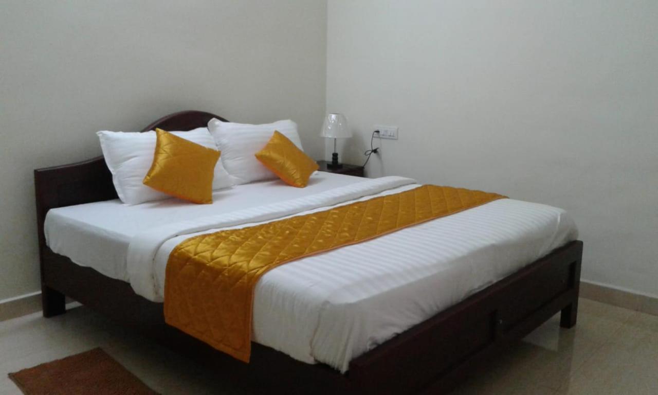 Mango Meadows Hotel กัตตะยัม ภายนอก รูปภาพ